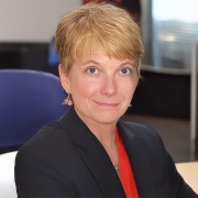 Woman with a blonde pixie cut